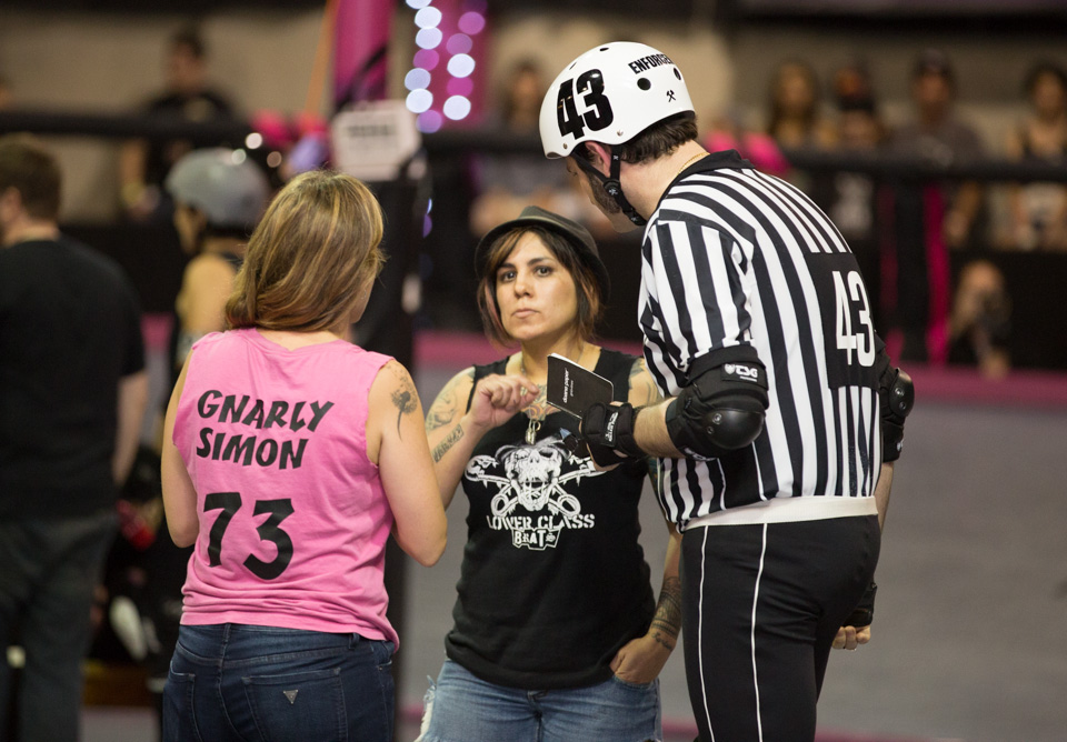 Head Referee delivers outcome of Official Review to Coaches